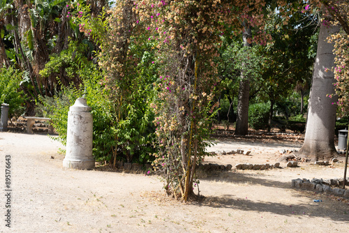 A stone column stands in a ...