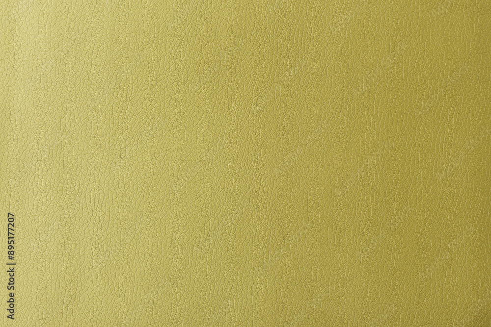 Obraz premium Texture of genuine leather, artificial leatherette yellow background
