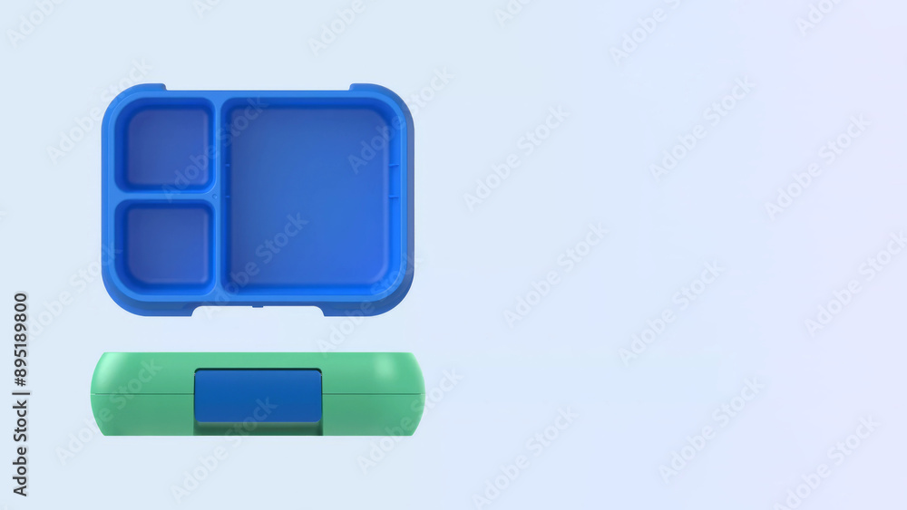Closeup of small bento lunchbox isolated on copy-space background. Closeup of small bento lunchbox isolated on copy-space background.