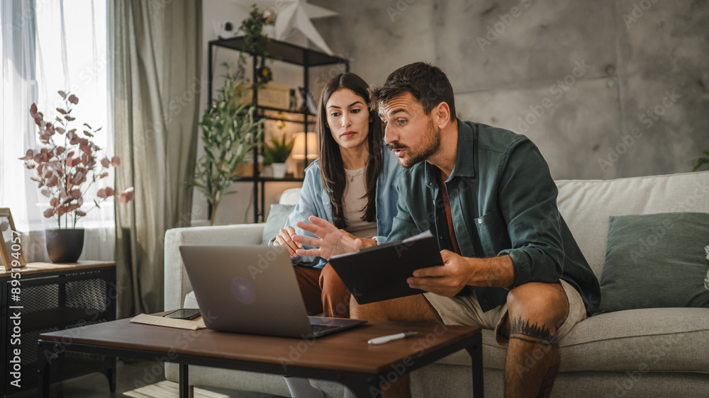 couple work from home on laptop and have video call consultation couple work from home on laptop and have video call consultation