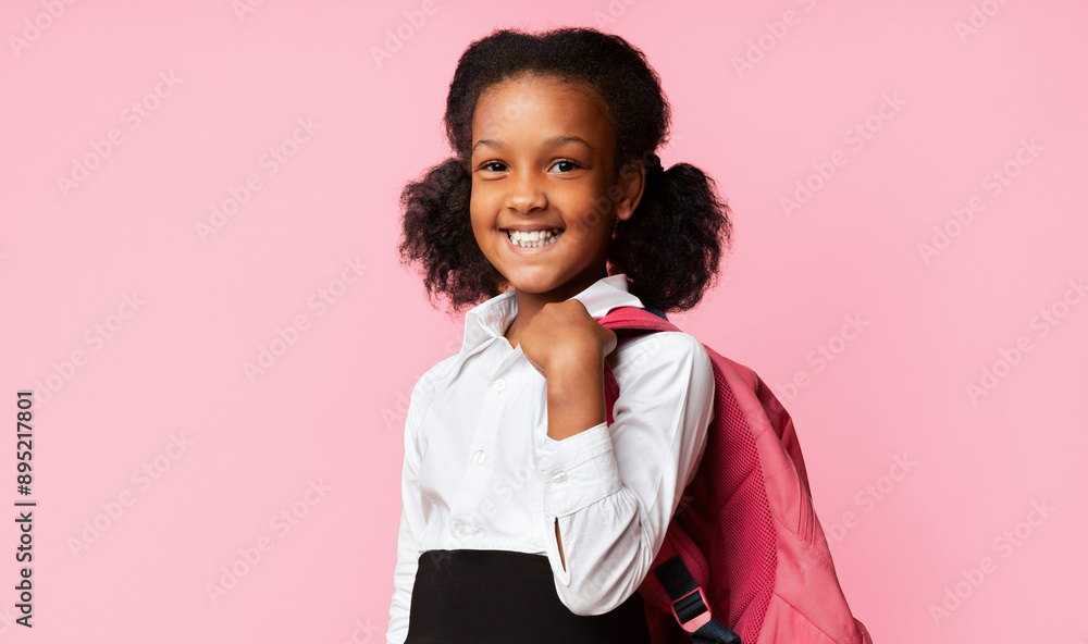 Happy Back-To-School Concept. Black Schoolgirl Holding School Backpack Smiling Posing In Studio On Yellow Background. Free Space For Text Happy Back-To-School Concept. Black Schoolgirl Holding School Backpack Smiling Posing In Studio On Yellow Background. Free Space For Text