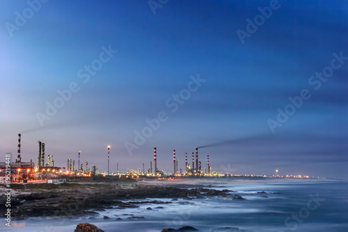 Wallpaper Mural Oil refinery by the sea at night. Torontodigital.ca