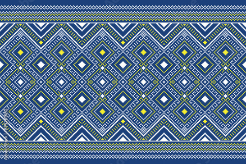 Fabric pixel abstract geometric pattern Thai stye on blue background. Design for clothing, fabric, background, wallpaper, wrapping, batik. Knitwear, Embroidery style. Aztec geometric art ornament