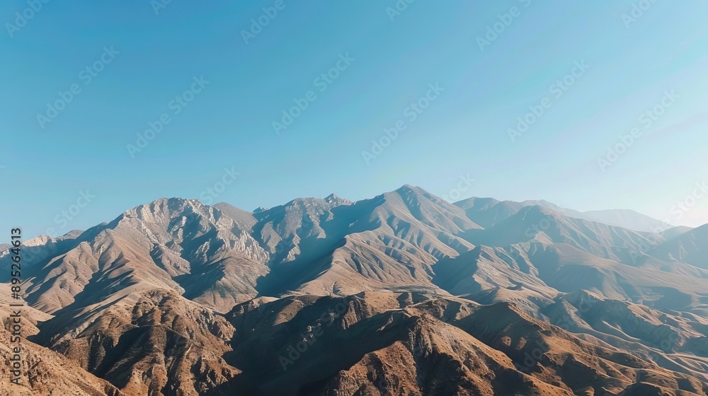 Philosophical Realism A detailed mountain range under a clear blue sky Philosophical Realism A detailed mountain range under a clear blue sky
