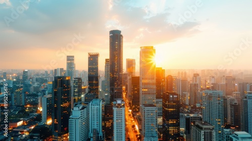 Breathtaking sunset over a bustling modern city with tall skyscrapers and busy streets, capturing the vibrant energy and golden hues of the evening urban landscape.