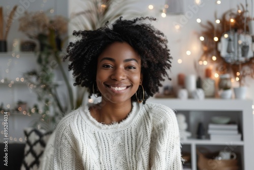 Smiling portrait of a young female African American interior designer