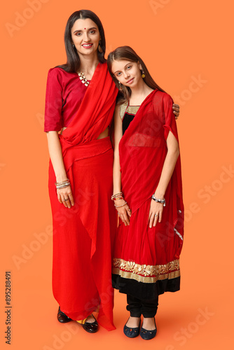 Mother with her daughter in...