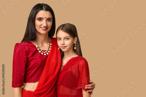 Mother with her daughter in...