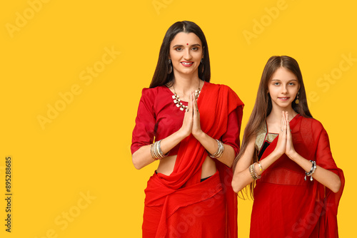 Mother with her daughter in...