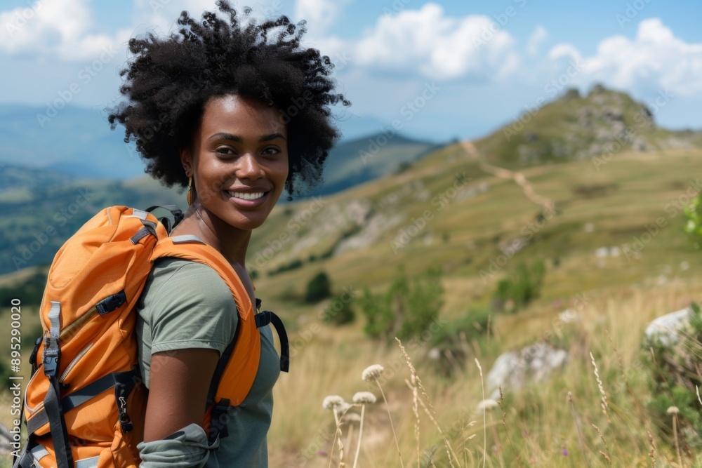 Portrait of a young black woman hiking in beautiful scenery Portrait of a young black woman hiking in beautiful scenery