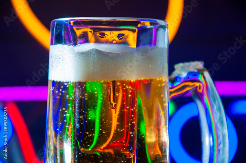 glass of beer with foam photo