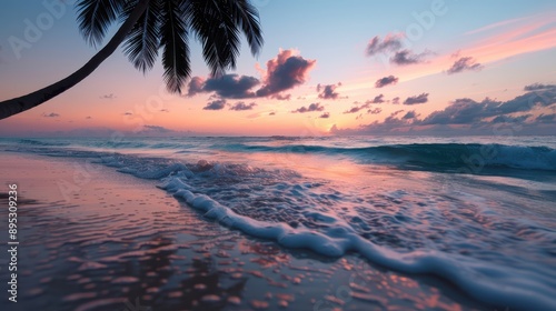 A stunning beach sunset showing palm trees and waves gently crashing on the shore, with a richly colored sky, evoking feelings of peace, beauty, and relaxation. photo