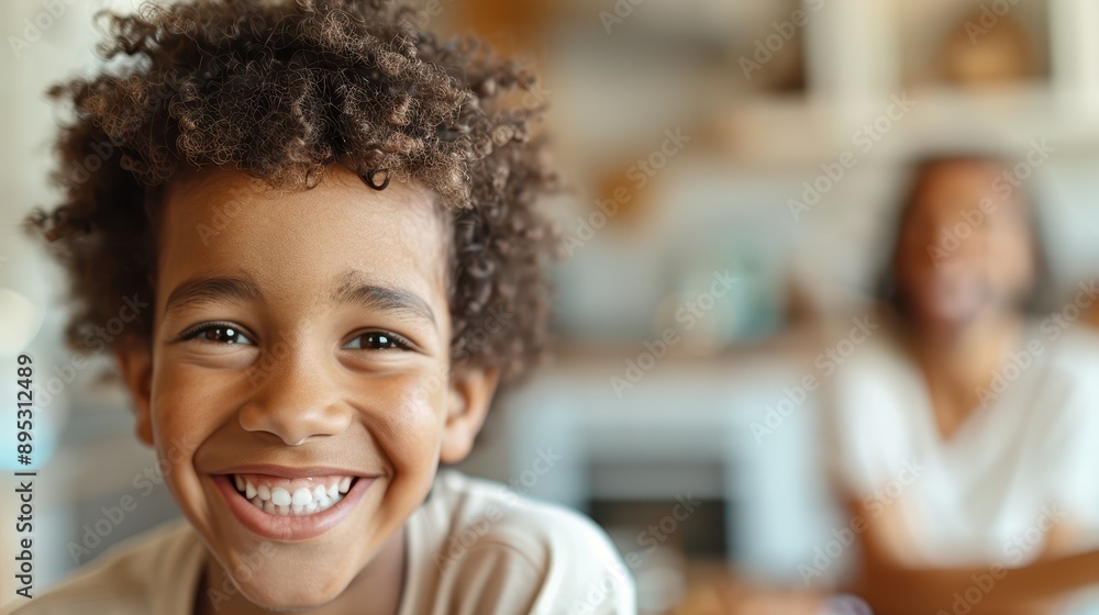 A vibrant smiling child in clear focus, with a warm and cozy indoor background, capturing the essence of innocence, joy, and the positive energy of childhood. A vibrant smiling child in clear focus, with a warm and cozy indoor background, capturing the essence of innocence, joy, and the positive energy of childhood.