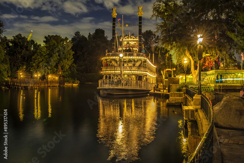 Tableau sur toile Anaheim, California, USA - July 27, 2023: Night view of a luxury steamboat with