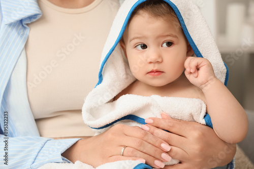 Cute little baby in towel w...