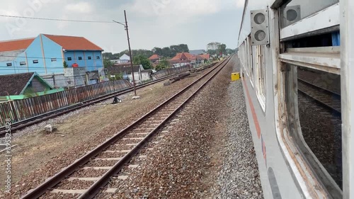 View from the side of a moving train photo