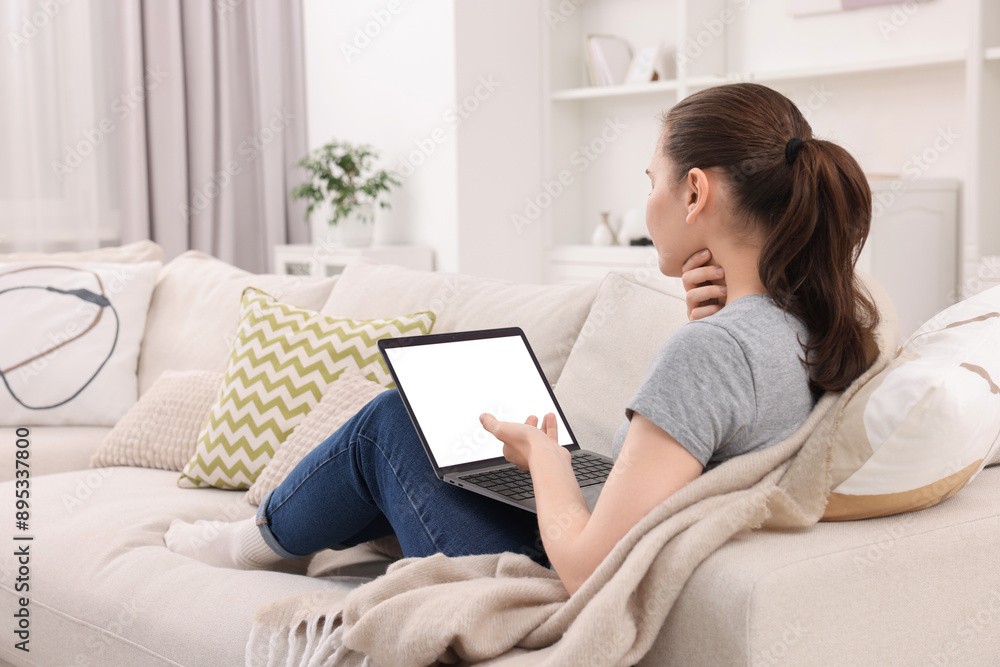 Sick woman having online consultation with doctor via laptop at home Sick woman having online consultation with doctor via laptop at home