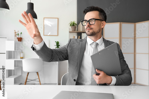 Young businessman with clip...