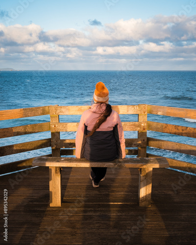 Fotografie Woman on the pier lookout