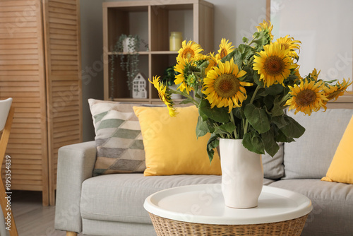 Wallpaper Mural Stylish living room with grey sofa and vase of sunflowers bouquet on coffee table Torontodigital.ca