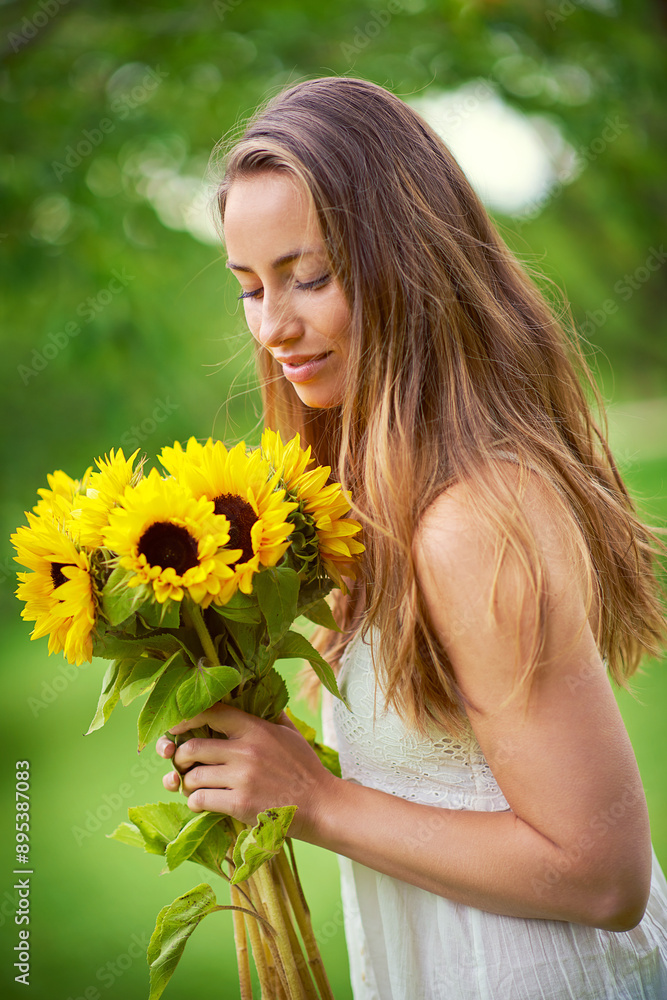 Nature, woman and bouquet of sunflowers with summer time, scent and ideas for floral present. Female person, relax and flowers in park with eco friendly gift for smelling, spring and sustainability Nature, woman and bouquet of sunflowers with summer time, scent and ideas for floral present. Female person, relax and flowers in park with eco friendly gift for smelling, spring and sustainability