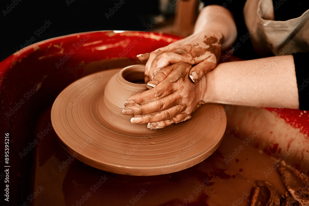Hands, pottery wheel and woman with clay, craft and creativity in workshop, hobby and artistic. Closeup, entrepreneur and person with equipment, designer and tools with small business and industry Hands, pottery wheel and woman with clay, craft and creativity in workshop, hobby and artistic. Closeup, entrepreneur and person with equipment, designer and tools with small business and industry