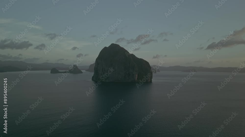 Cliffs on small islands in Philippines sea, sinking aerial pull-out Cliffs on small islands in Philippines sea, sinking aerial pull-out