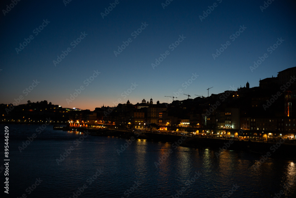 Porto, Portugal, Oporto on the Duoro River at night, sunset, light on the water front, bridge, Ponte Luiz, Eiffel bridge, tourism, travel, Europe tourist destination Porto, Portugal, Oporto on the Duoro River at night, sunset, light on the water front, bridge, Ponte Luiz, Eiffel bridge, tourism, travel, Europe tourist destination
