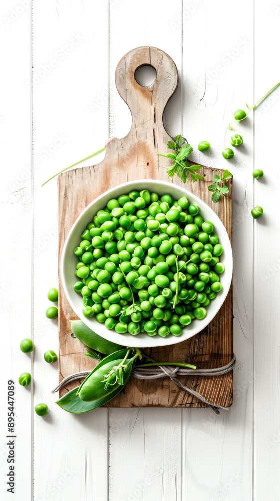 Pea pods filled in bowl placed on chopping board Pea pods filled in bowl placed on chopping board