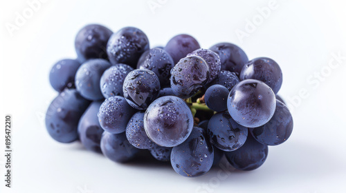 A bunch of purple grapes with a white background, showcasing the plumpness and vibrant color photo