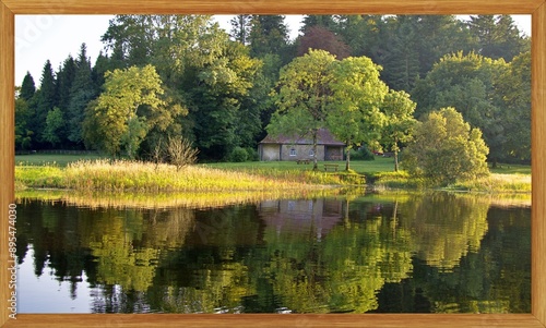 A small quaint house in the woods by a lake, in an enchanted magical landscape, with reflections on water.