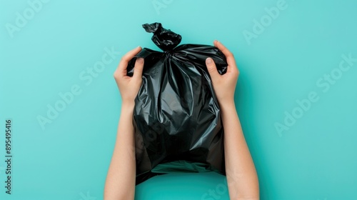 Holding a Garbage Bag