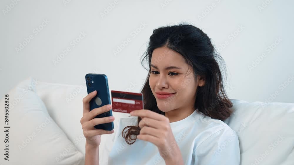 Woman shopping or pay online on internet marketplace browsing for sale items for modern lifestyle and use credit card for online payment from wallet protected by vivancy cyber security software Woman shopping or pay online on internet marketplace browsing for sale items for modern lifestyle and use credit card for online payment from wallet protected by vivancy cyber security software