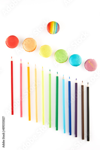 Colorful Pencils Surrounding Rainbow Macaron