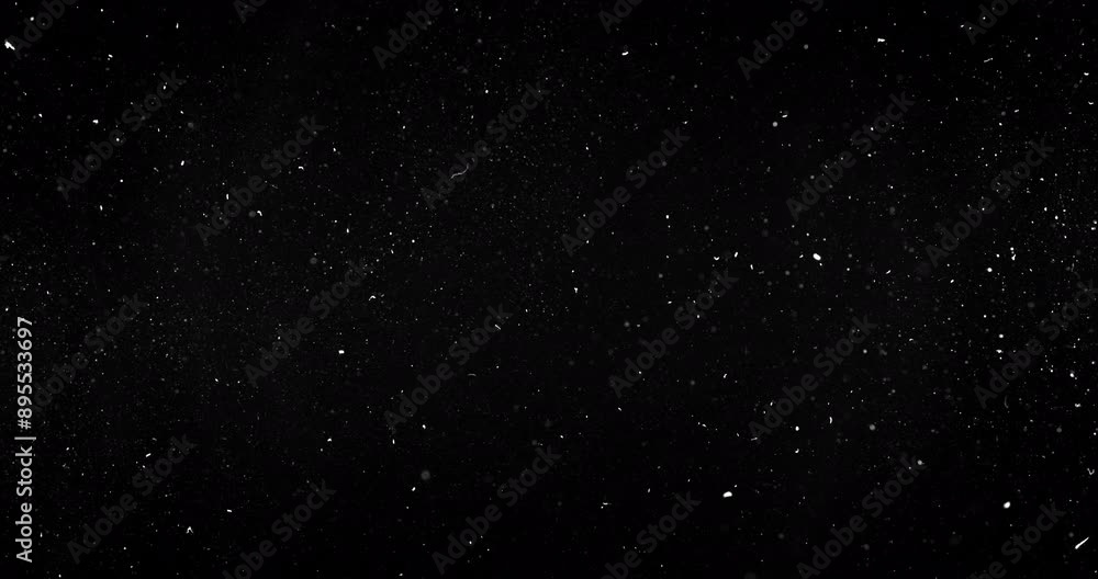 Dust particles dynamically moving on black background. Dense dynamic particles floating around. Dust particles dynamically moving on black background. Dense dynamic particles floating around.