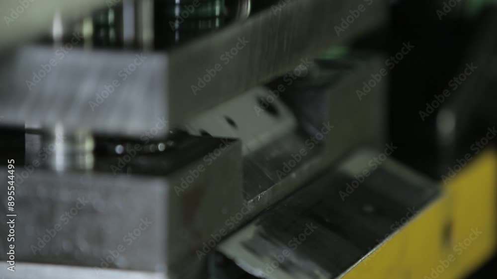The process of manufacturing parts inside a factory The process of manufacturing parts inside a factory