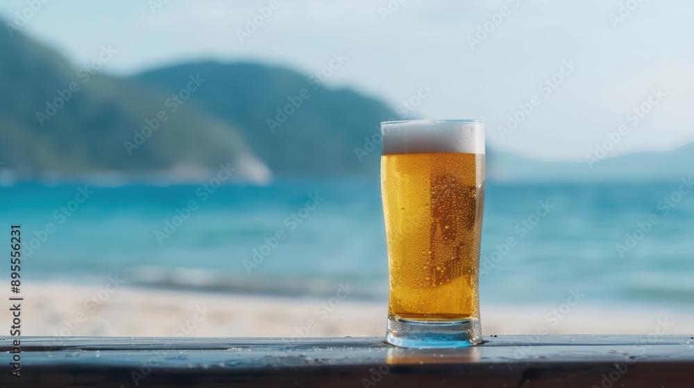 A frosty glass of Thai Beer with a scenic beach background, banner, with copy space A frosty glass of Thai Beer with a scenic beach background, banner, with copy space