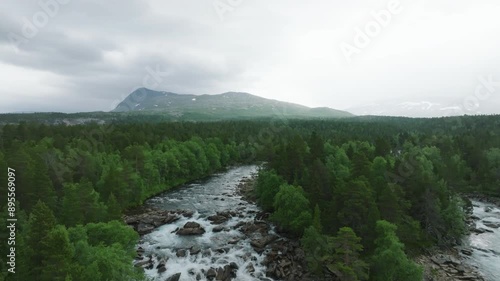 Amazing river and mountain range landscape in Norway Saltfjellet