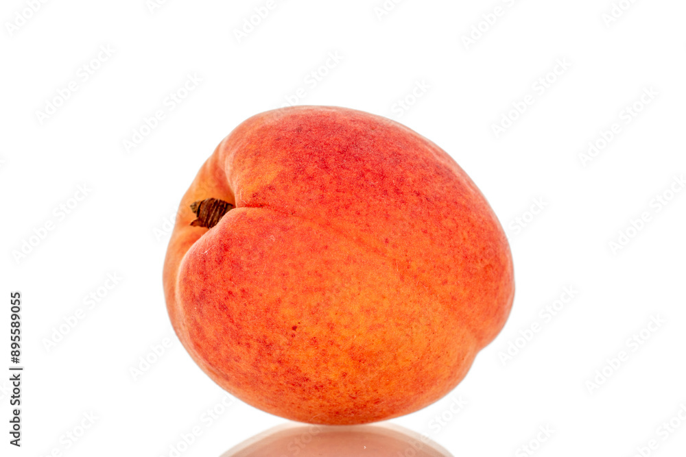 One ripe apricot, macro, isolated on white background. One ripe apricot, macro, isolated on white background.