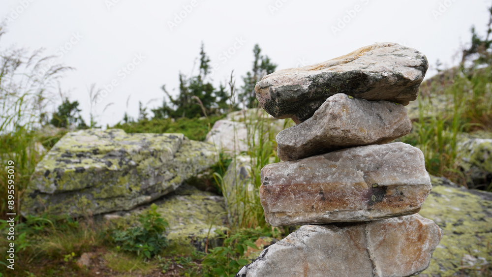 Stones pyramid on sand symbolizing zen, harmony, balance. Stones pyramid on sand symbolizing zen, harmony, balance.