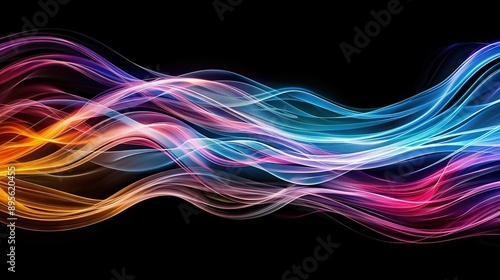  A multicolored wave of light on a black background, with a black background to the left of the image