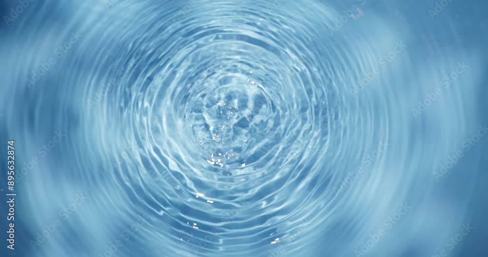 Drops of Spring Water Fall Down and Create an Unusually Beautiful Water Texture. Drops of Spring Water Fall Down and Create an Unusually Beautiful Water Texture.