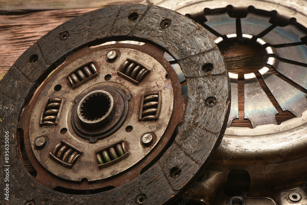 Car clutch basket on the car service workbench background. Top view. Close up. Car clutch basket on the car service workbench background. Top view. Close up.