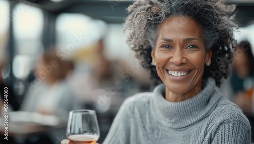 Smiling Woman Enjoying Dinner at Restaurant