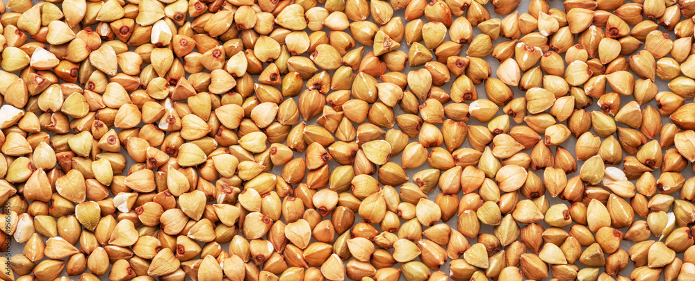 Hulled kernels of buckwheat cereal isolated on white background. Hulled kernels of buckwheat cereal isolated on white background.