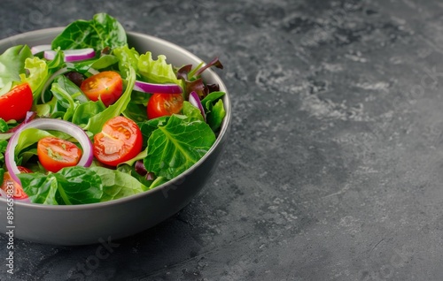 Fresh Green Salad With Cherry Tomatoes and Red Onion