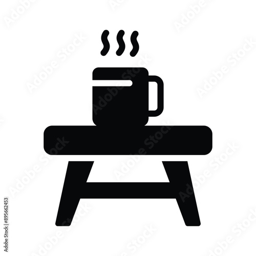 A coffee cup laying on the table, icon of coffee table