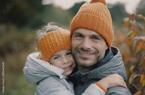 Father And Daughter Smiling In Autumn