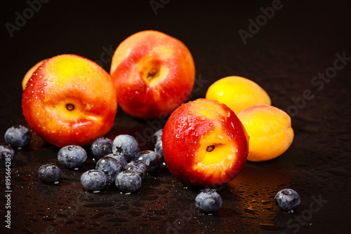 fresh nectarines in water drops	Palette with paints and canvases.
 photo