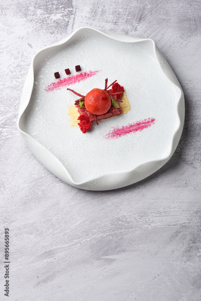 Beef tartar with a quail egg served Beef tartar with a quail egg served